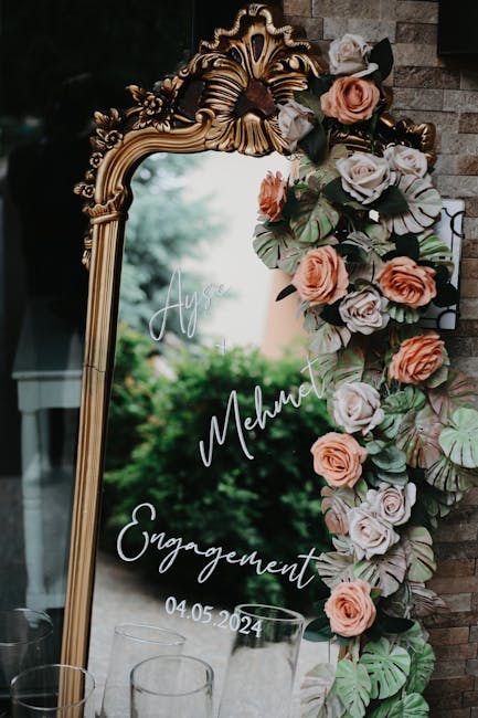 Antique gold-framed mirror wedding welcome sign with white calligraphy lettering
