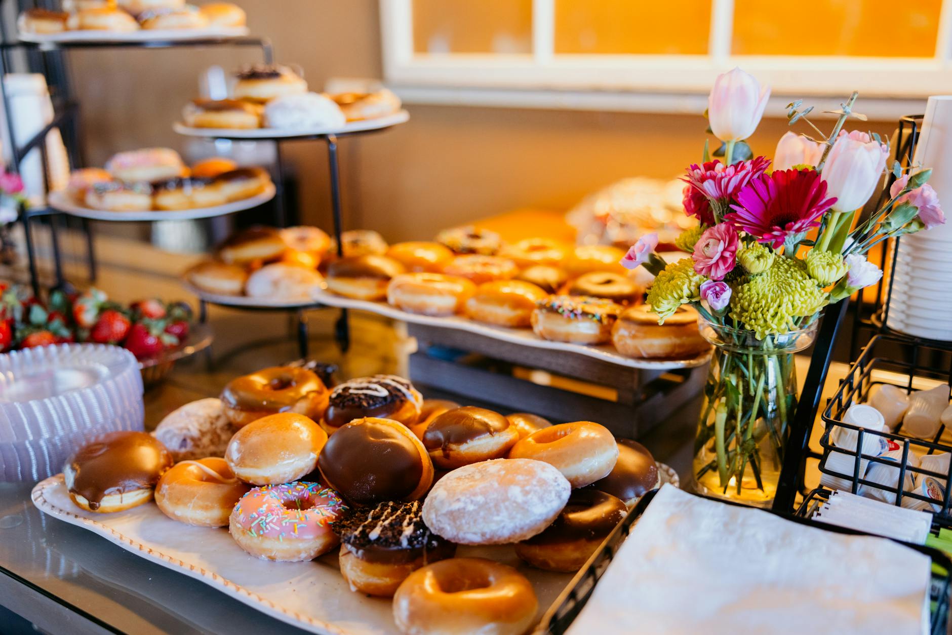 Donut wall as a popular wedding cake alternative for modern receptions
