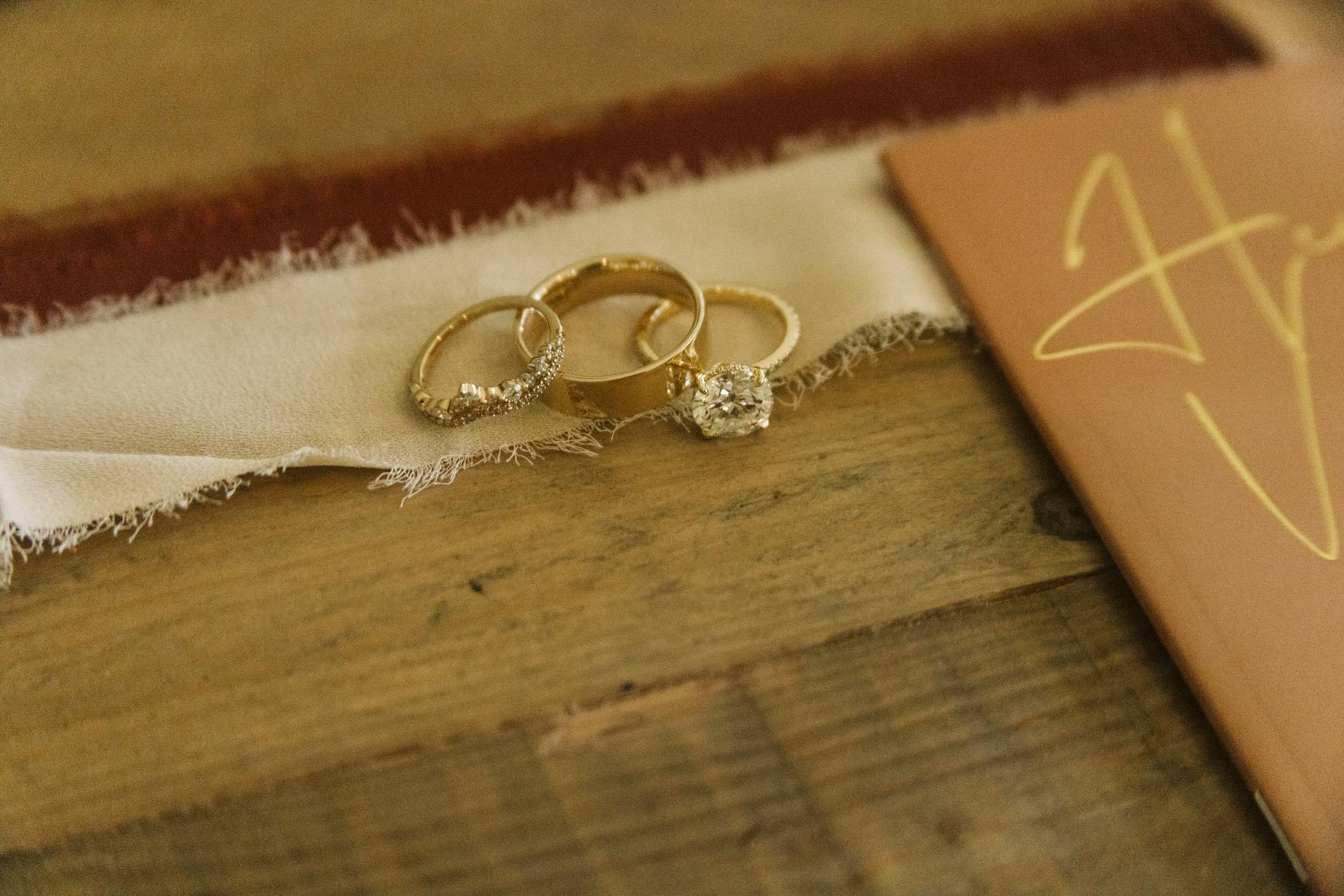 His and hers linen wedding vow books with gold foil lettering