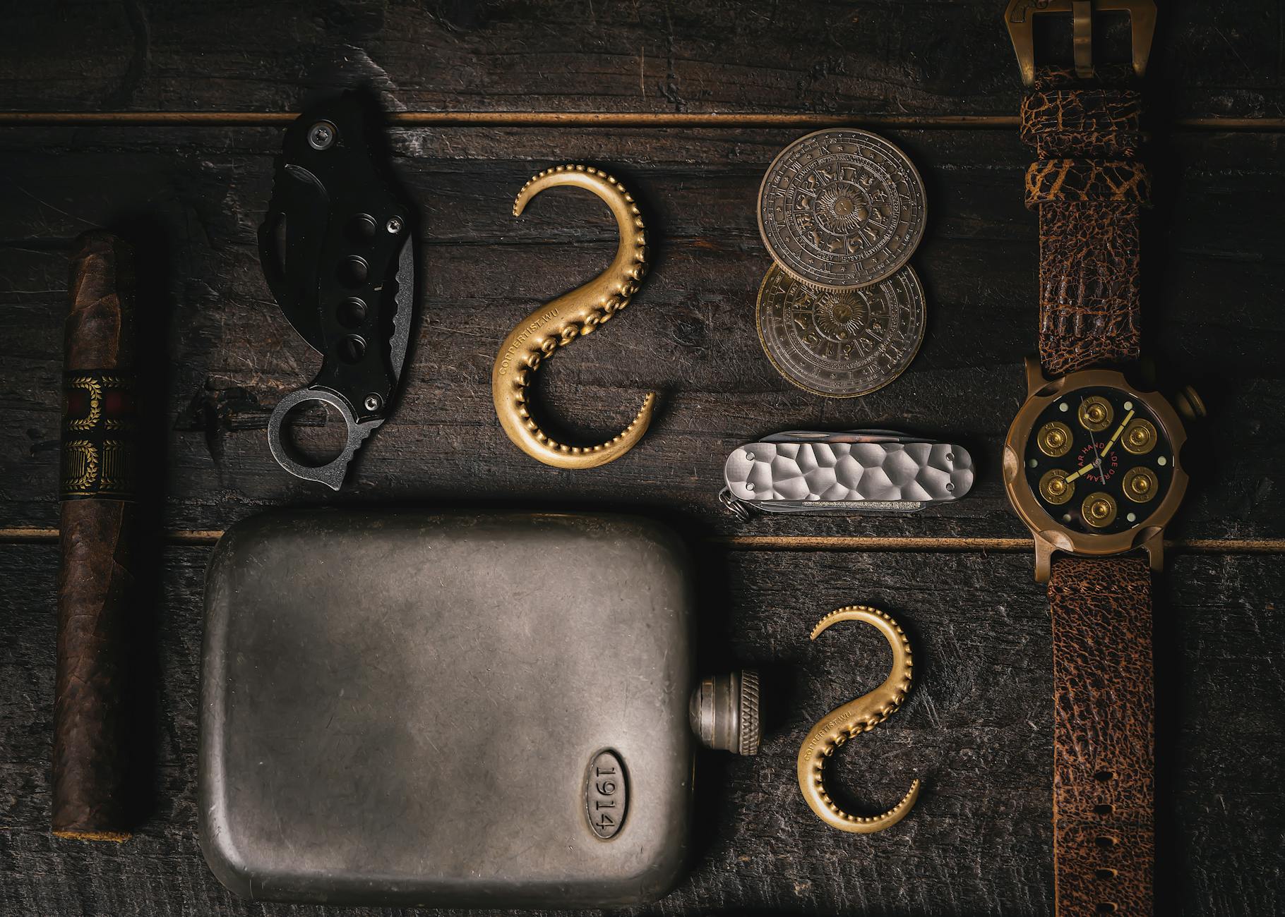 Open groomsman proposal box showing flask, pocket knife, cigar, and bottle opener