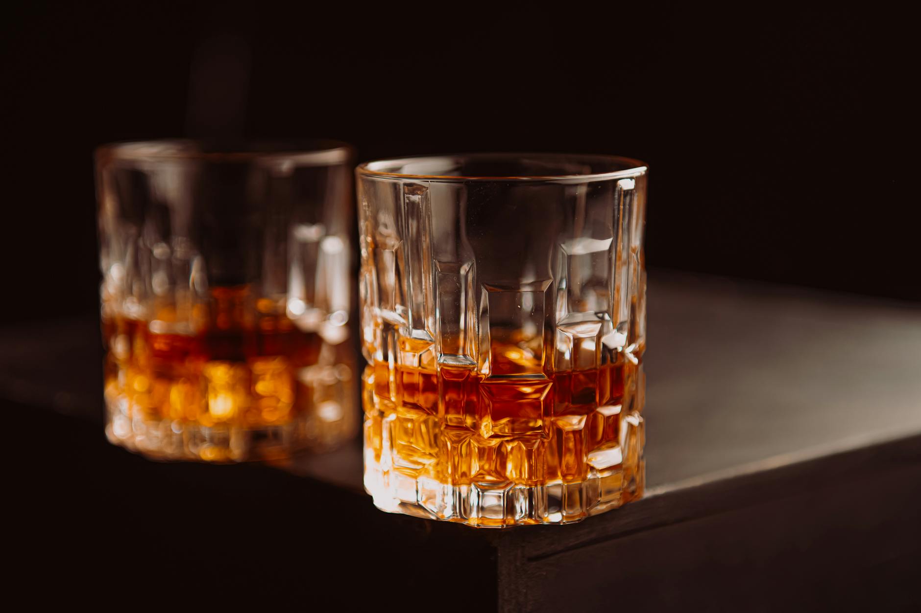 Whiskey-tasting themed groomsmen gift with bourbon and engraved glasses