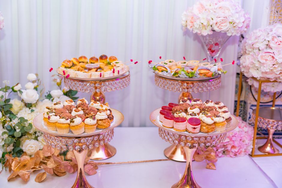 Tiered dessert-table display using multiple wedding cake stands