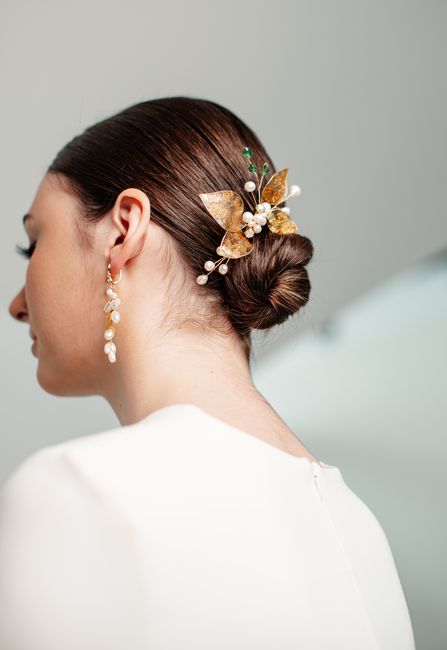 Pearl bridal hair comb, a classic bridal hair accessory idea, set into a low bun