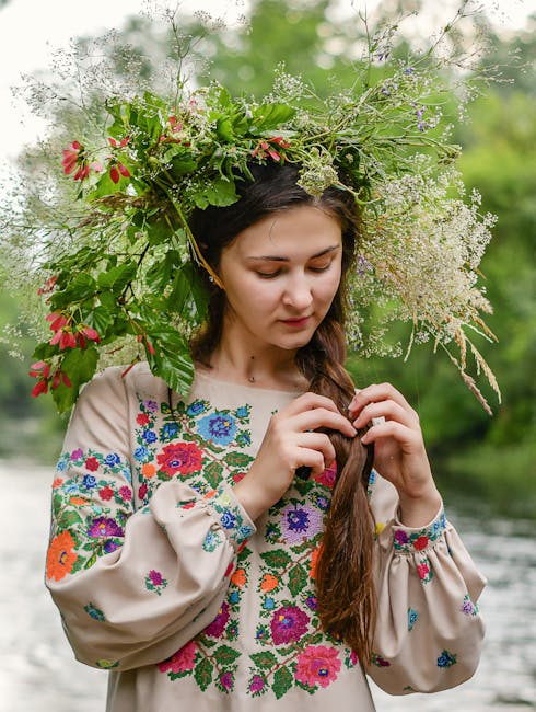 Floral bridal headpiece, a boho bridal hair accessory idea, in a loose braid