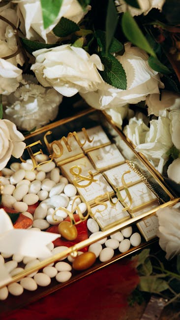 Personalized engraved wedding cake cutting set displayed in a wooden keepsake box