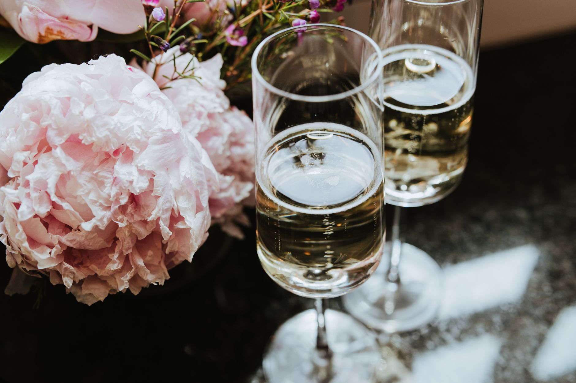 Personalized engraved wedding toasting flutes etched with the couple's names and date
