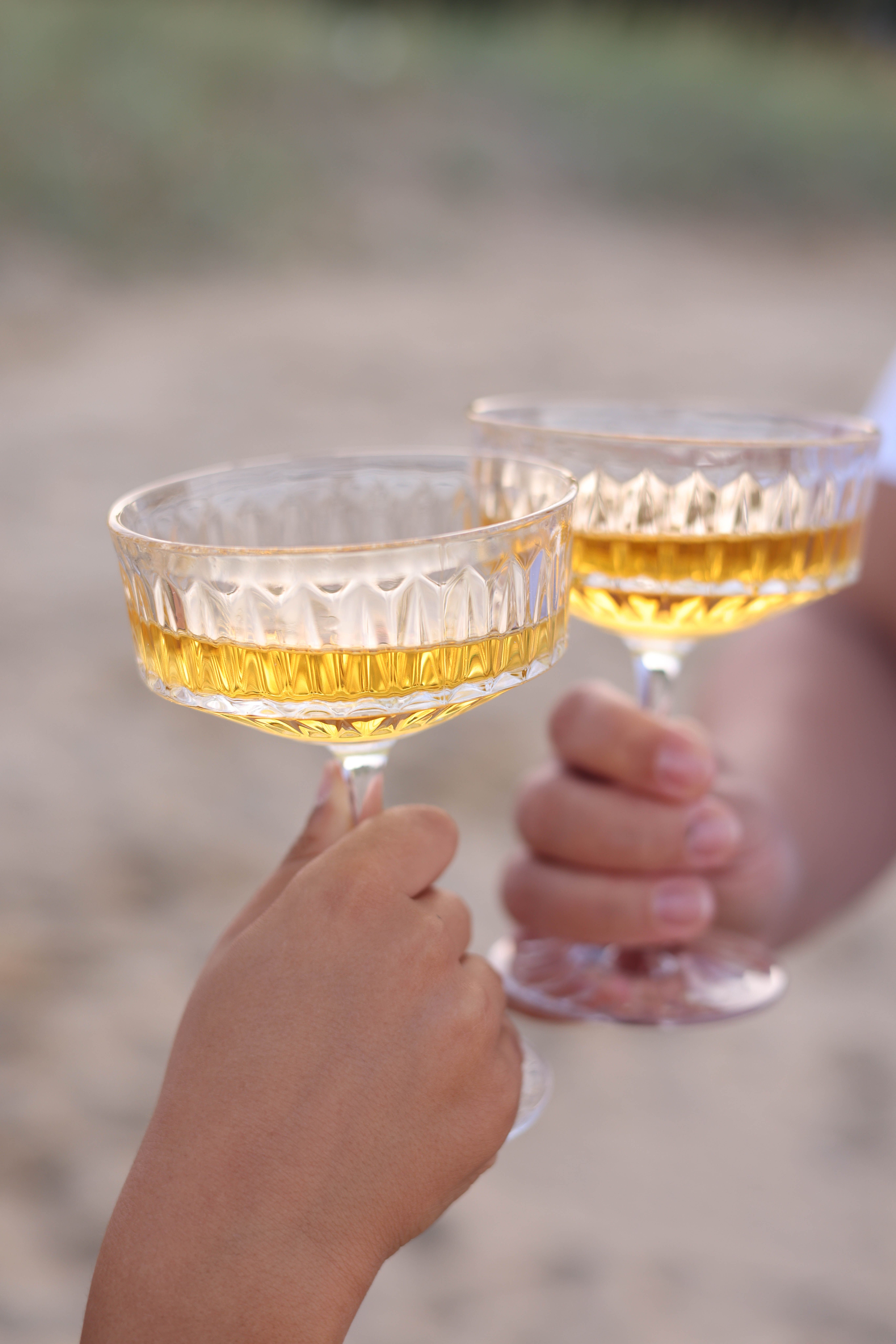 Crystal wedding toasting flutes with gold lettering displayed in a gift box