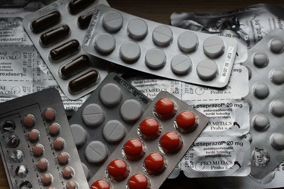 Individually wrapped pain relief packets included in a wedding hangover kit