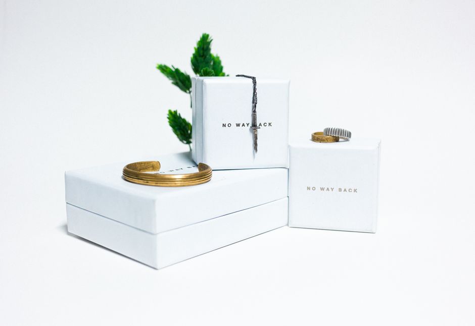 Delicate personalized bracelets in a gift box, a bridesmaid gift idea meant to be worn long after the wedding