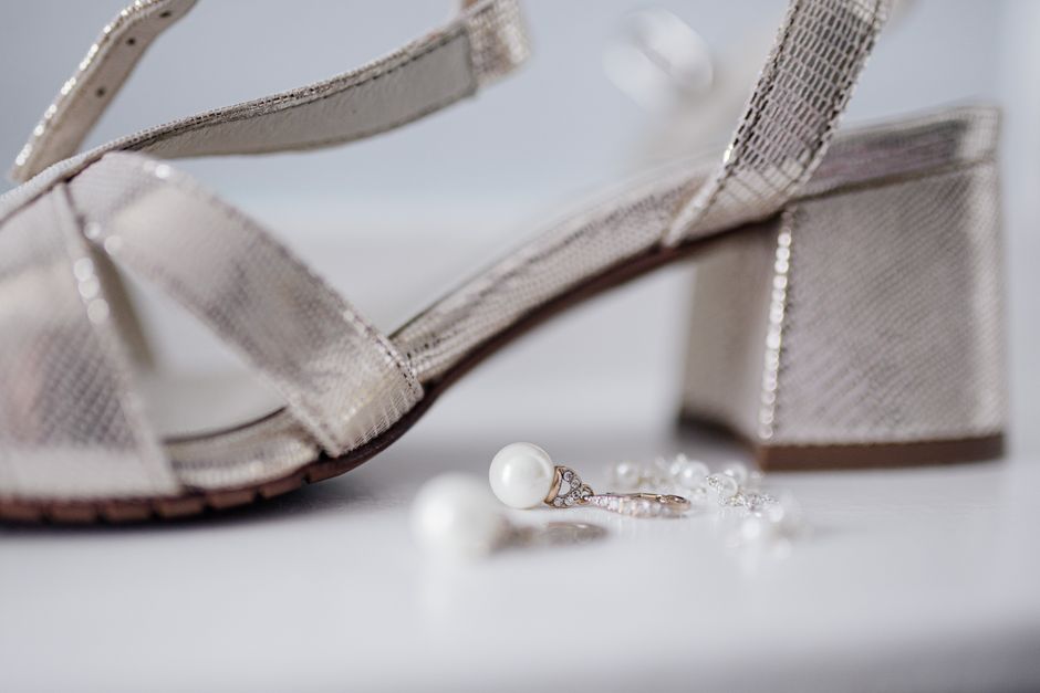 Comfortable bridal block heel sandals styled with a wedding dress