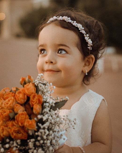 Flower girl dress idea paired with a pearl headband accessory