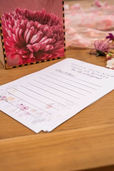 Bridal shower bingo cards spread out for guests to play