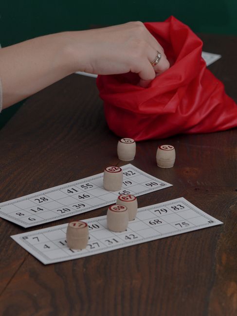 Large bridal shower guest list playing bingo game together