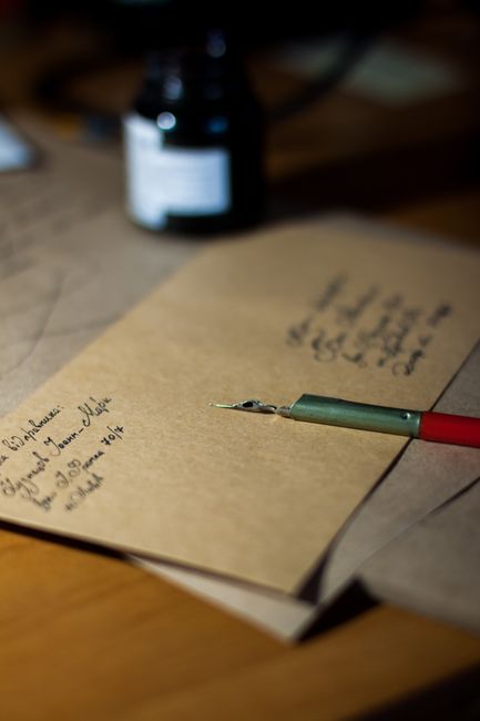 Hand lettering wedding guest addresses with calligraphy dip pen