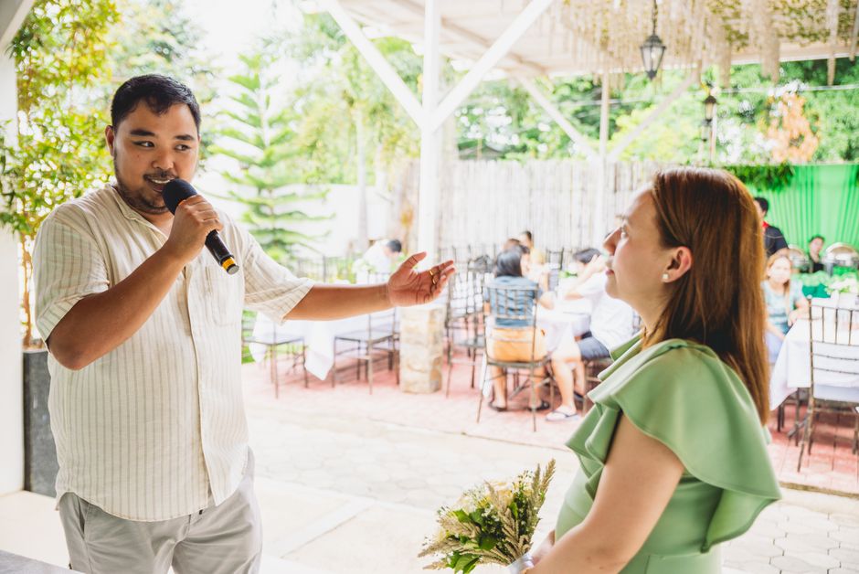 Portable PA speaker and microphone set up for rehearsal dinner toasts