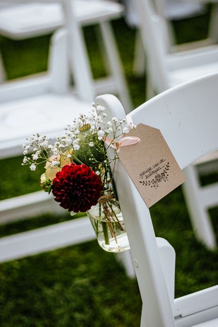 Personalized engraved memorial charm tag on a bouquet
