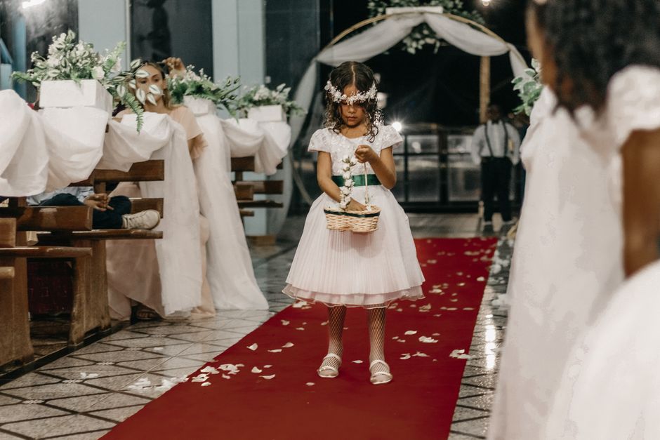 Ring bearer sign paired with a coordinated wedding outfit