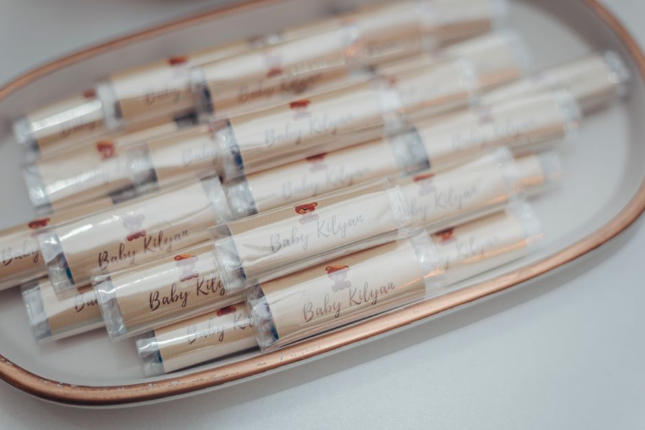 Succulent-scented lip balm favors arranged for a garden-themed bridal shower