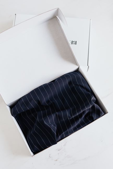 Wedding dress storage box sized for a gown with a train
