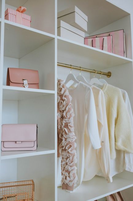Compact wedding dress storage box on a closet shelf