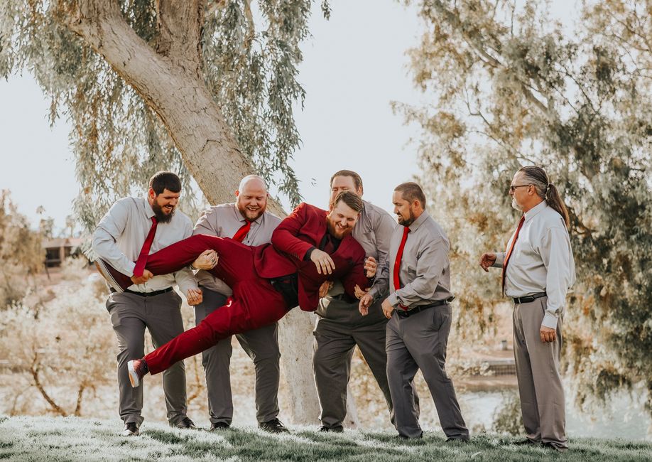 Groomsmen in funny novelty socks, a playful alternative to traditional wedding dress socks