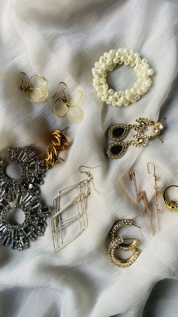 Engagement party outfit ideas featuring gold statement drop earrings