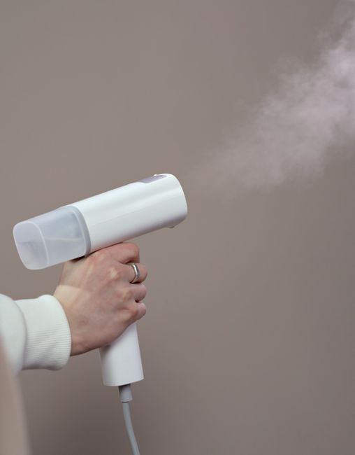 wrinkle release spray as a wedding dress steamer backup