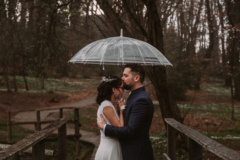clear bubble umbrellas for a rainy wedding party