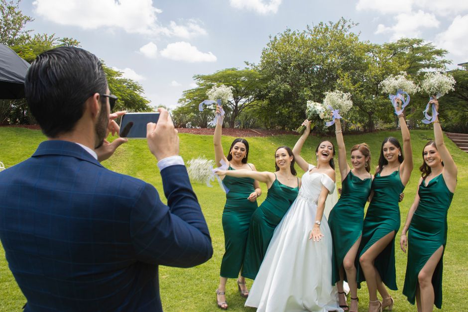 bridal party using matching clear wedding umbrellas
