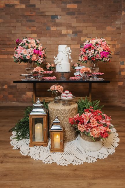 Mini white metal lanterns used as wedding table centerpieces