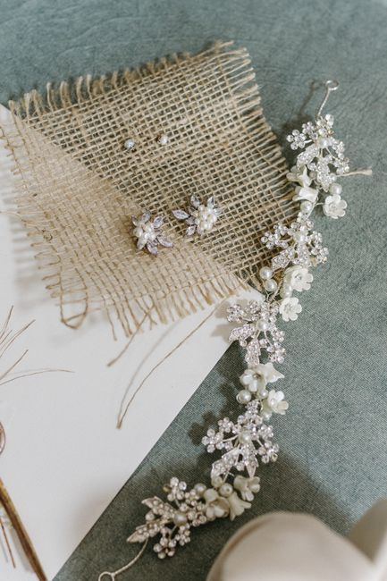 Pearl and rhinestone bridal belt styled in a flat lay