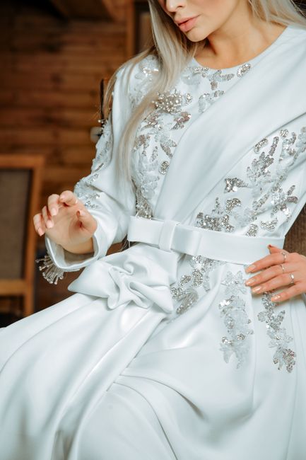 Silver rhinestone wedding dress sash on a white gown