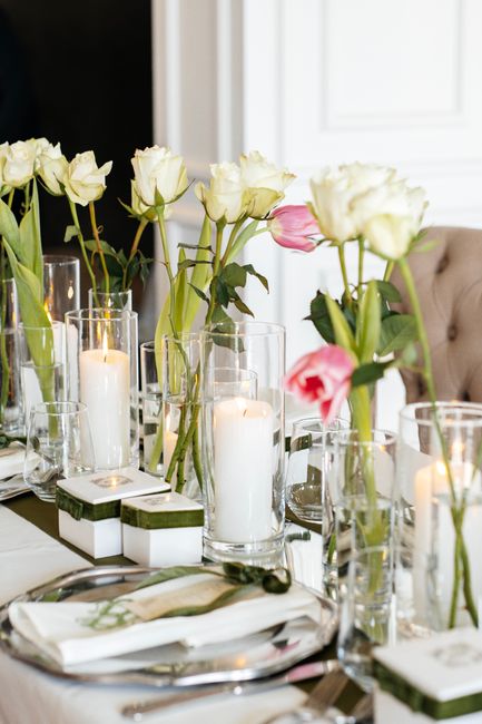 Flameless pillar candles in wedding candle holders