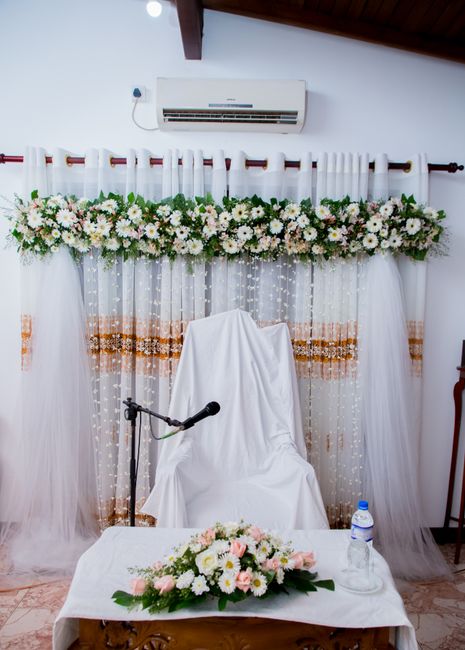 Flower garland on a wedding sweetheart table