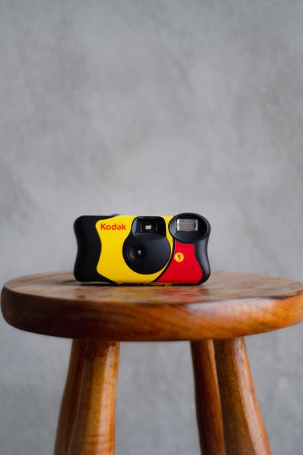 Single-use film camera with built-in flash for wedding guests