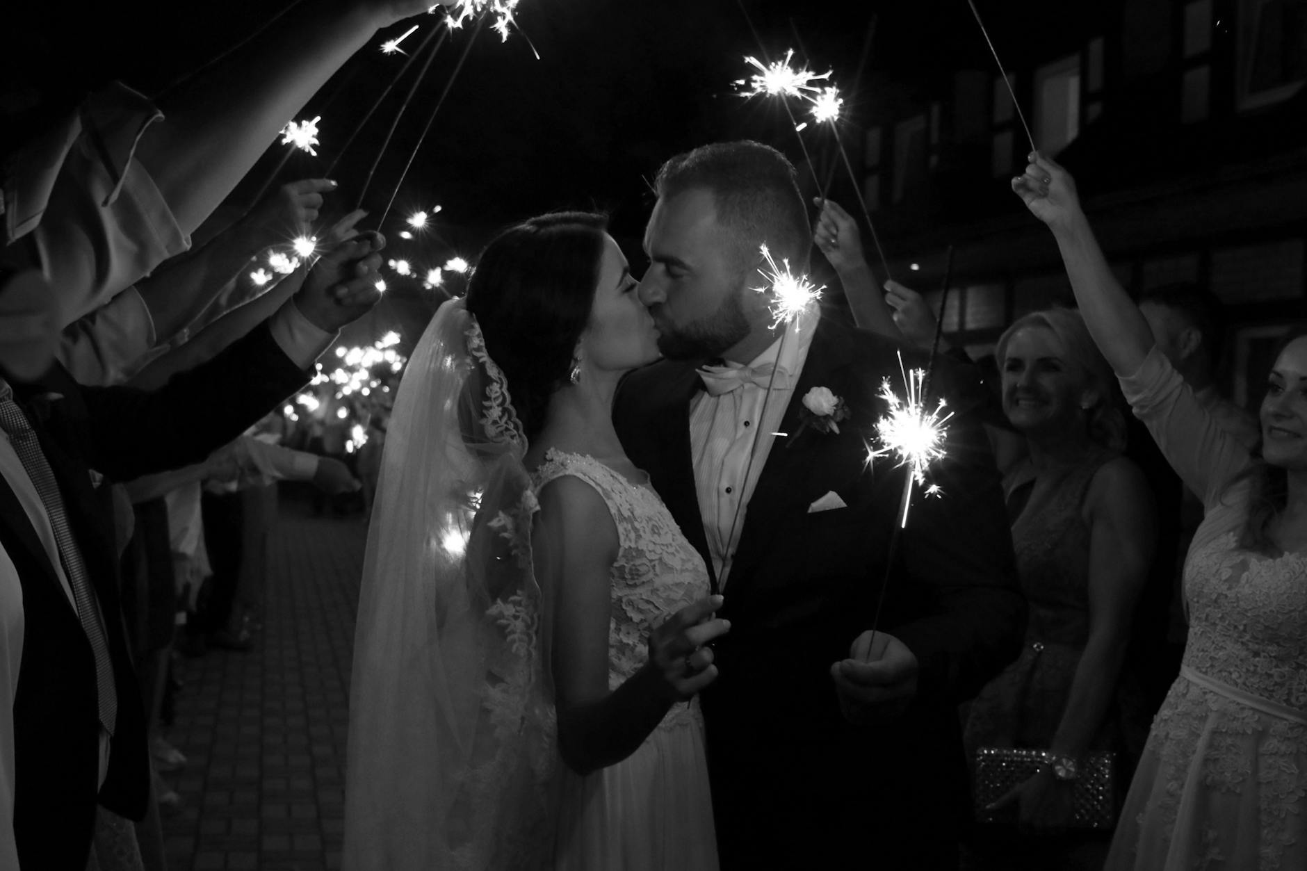 Rustic wedding venue stone exit lit at night — ideal backdrop for a sparkler send-off