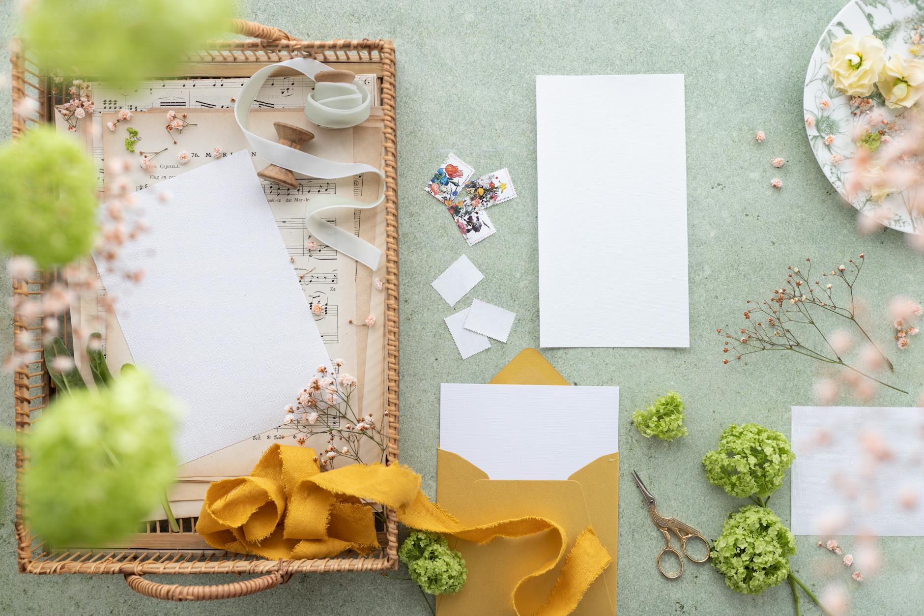 Creative wedding place card materials including acrylic and pressed flowers