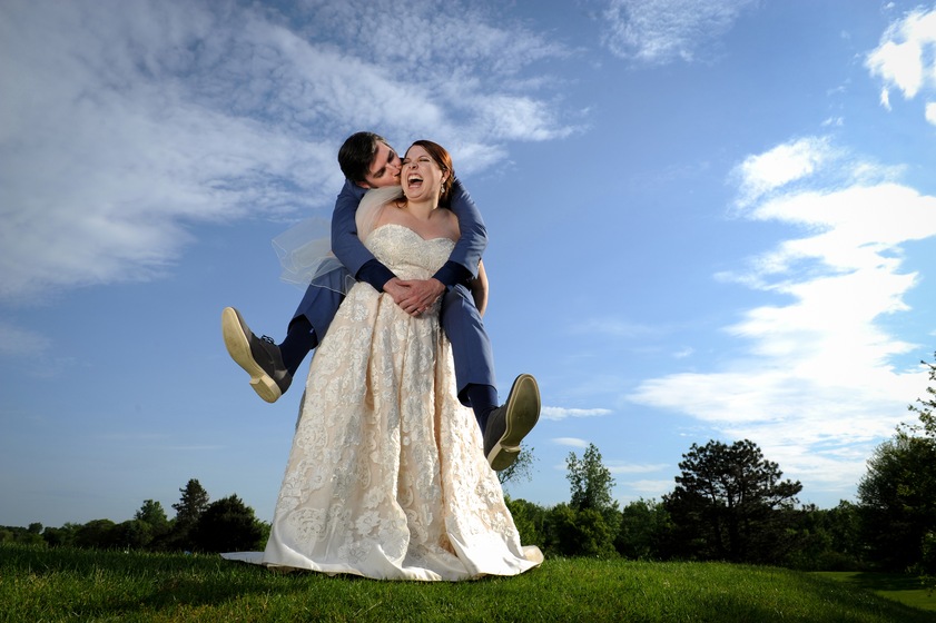 Marci Curtis - Michigan Wedding Photojournalist wedding vendor photo